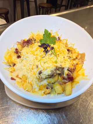 Ración De Patatas Gratinadas Con Bacon