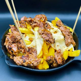 Patate al forno, salsiccia e provola