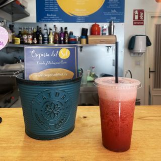 Smoothie de naranja y frutas del día 