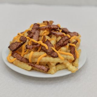 1/2 Batata com cheddar e bacon