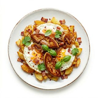 Huevos Rotos Con Foie Y Cebolla Caramelizada