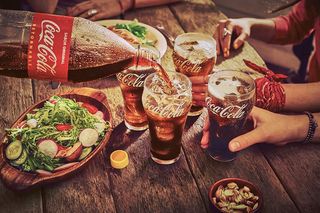 Pizza kebab completa	Coca-Cola Lattina 330ml