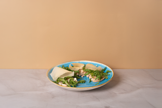 Tagliata di pollo con rucola e grana