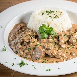 Говядина с грибами в сливочном соусе