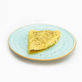 Crepe De Pollo Braseado, Queso De Cabra Y Cebolla Caramelizada