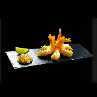 Хвости тигрових креветок в темпурі з соусом том-ям