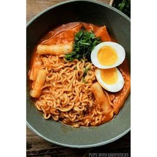 Noodles, Fried Egg, Fish And Hotdog With Pack