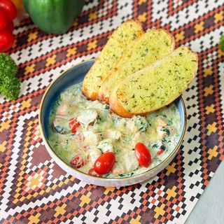 Соте из семги, креветок и судака