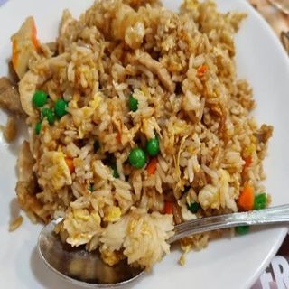 Arroz salteados Con Pato