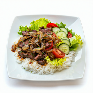 Carne De Ternera Encebollada Con Arroz Y Ensalada