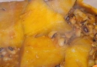 Beans and yam with a piece of meat
