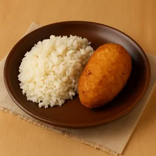 Рис з котлетою по-київськи (310г)