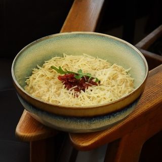 Вівсяна каша з в'яленими томатами та пармезаном