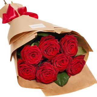 Букет в ЕКО упаковці "7 червоних троянд"