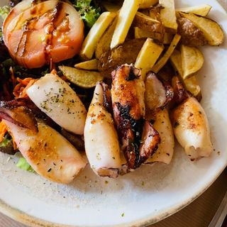 Lulas salteadas com manteiga de alho