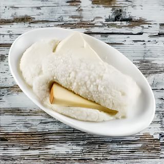 ღომი ჩახარშული ყველით