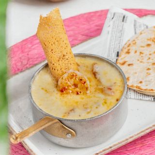 Cazuela de queso fundido con Camarones (langostinos )
