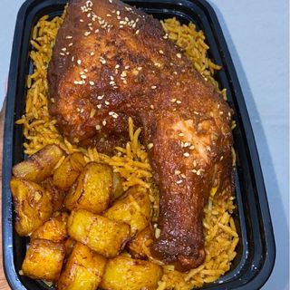 Jollof/Fried Rice + ¼ Chicken