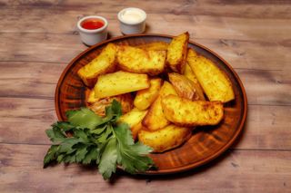 Картопля запечена скібками (150г)