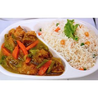 White Rice And Sauce With Chicken