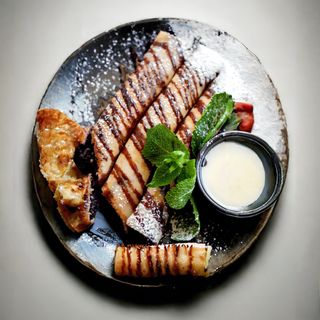 Млинці з маком, горіхами та родзинками зі згущеним молоком (240/50г)