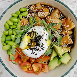Bowl with poached egg, teriyaki chicken, and avocado