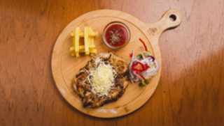 Punjeni pileći batak lunch paket + Na poklon Stella Artois 0.5l