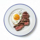 Filete De Ternera Con Huevo Frito Y Patatas