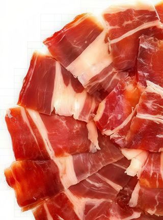 RACIÓN DE JAMÓN IBÉRICO CORTADO A CUCHILLO