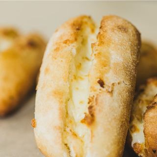 Pan de ajo con queso (4u)