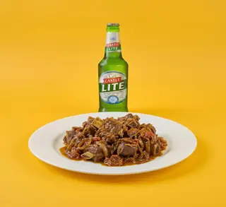 1/2 Wet fry goat meat plain + Castle Lite