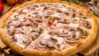 Prosciutto e funghi