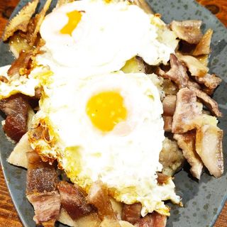 Huevos Rotos Trufados c/Papada Ibérica