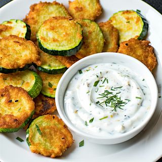 Тиквички с млечен сос (250г)