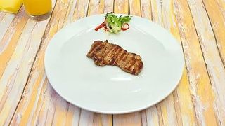 Musciulet de porc impanat cu usturoi