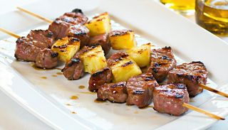 Pork and Pineapple Skewers With Steamed Brocolli and Carrot veggies