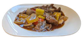 Manzo saltato con peperoni e cipolla