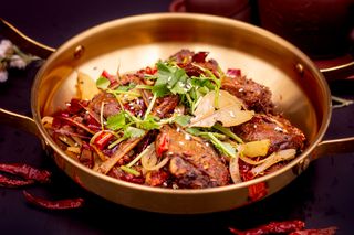 Testa di anatra pechinese piccante/麻辣鸭头
