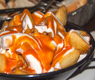 Ración De Patatas Bravas