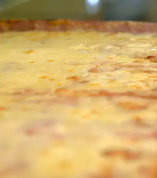 Pizza Jamón Y Queso corte