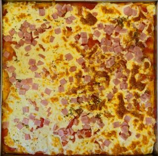 Pizza Prosciutto (1 Porción)