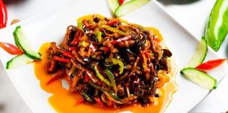 Жареная говядина с рыбным привкусом