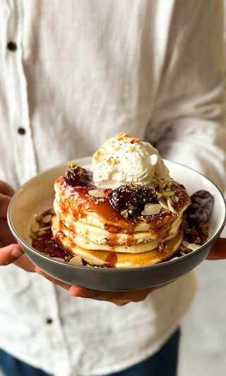 Pancakes with strawberry jam, ice cream and granola