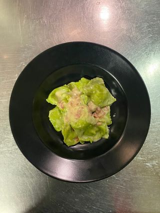 Tortelli verdi di patate e provola con guanciale e crema di parmigiano