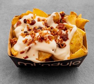 Patate con fonduta di formaggi silani e pancetta