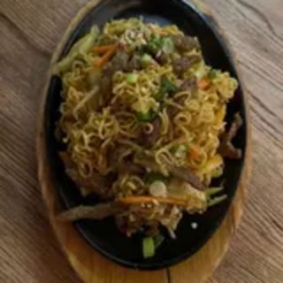 Noodles al Curry con Pollo