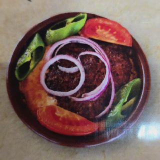 Kebab con queso sobre ketsi