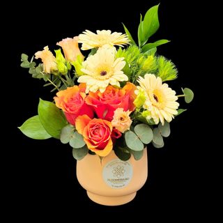 Aranjament in vase ceramica in nuanțe peach si portocaliu