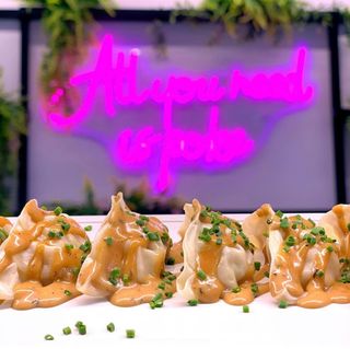 Gyozas de cerdo con salsa trufada y cebollino (6 uds.)