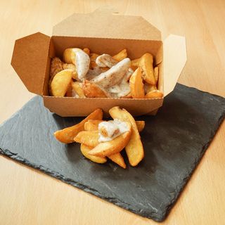 Patatas crema de queso y tartufo